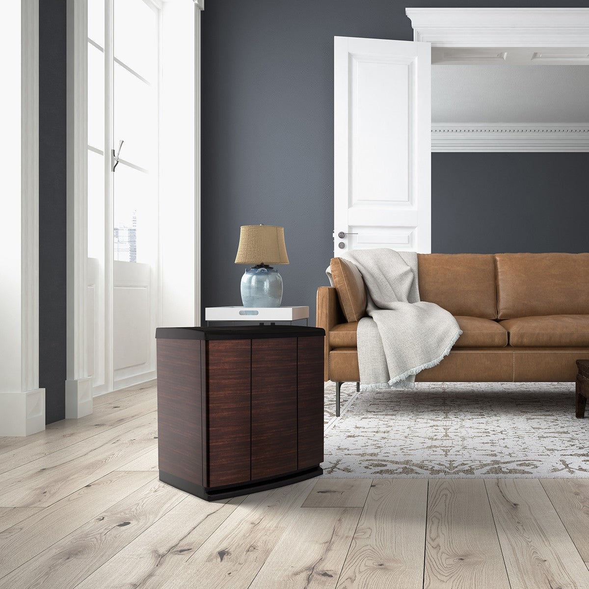 AIRCARE Alliance Whole House Console Humidifier - on floor of modern living room with hardwood floors