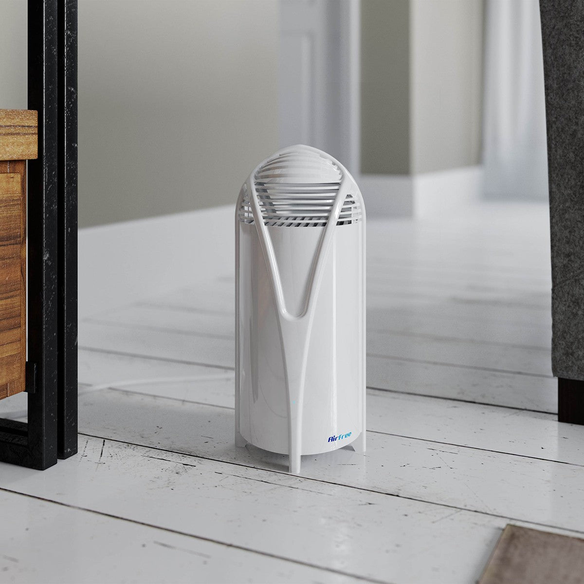 AirFree T Portable Air Purifier - on floor in living room