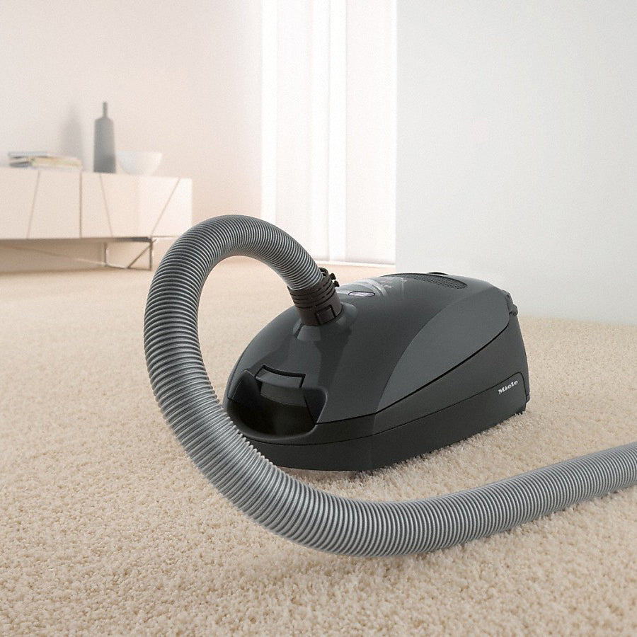 Miele Classic C1 Pure Suction Canister Vacuum Cleaner - In Living Room