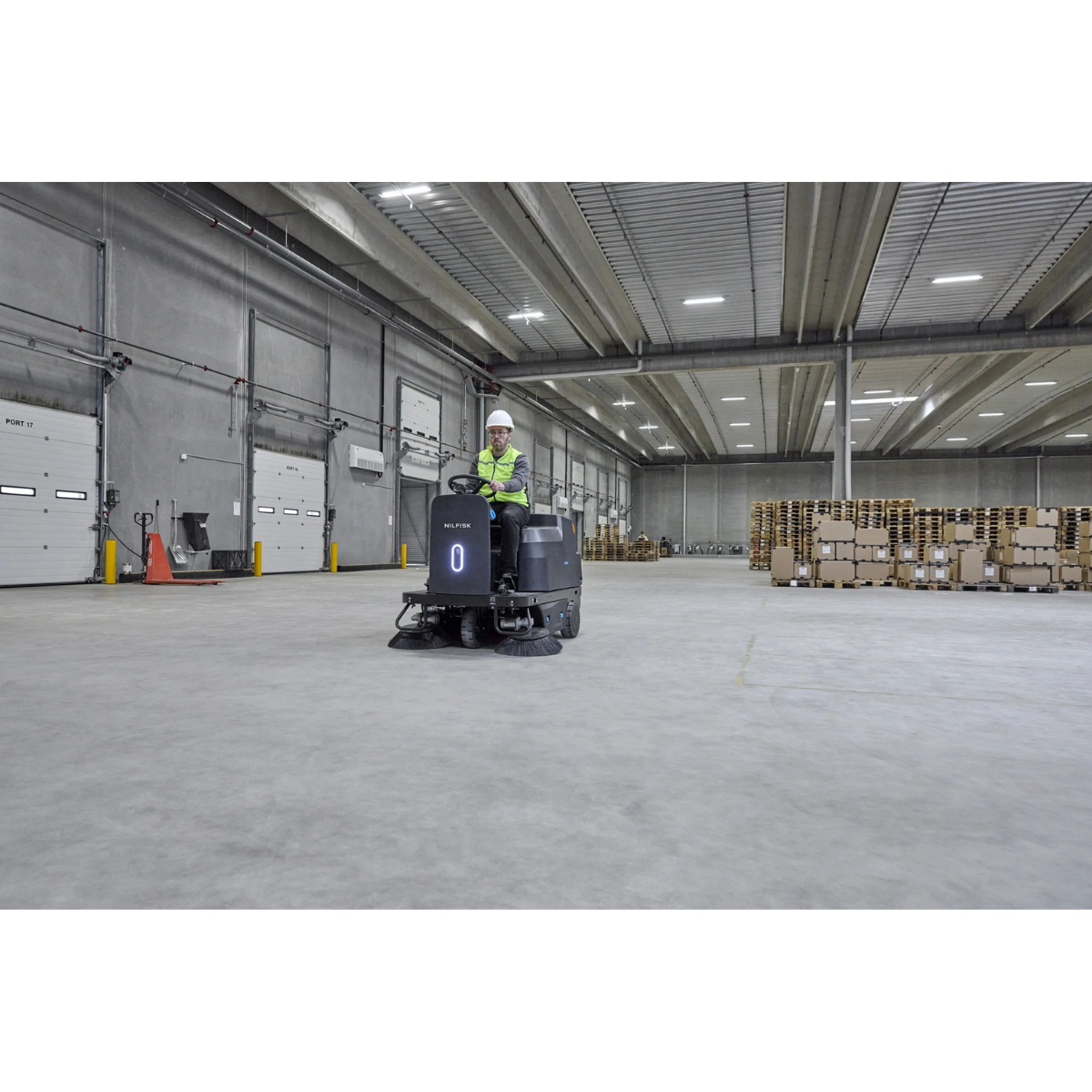 Nilfisk SW3000 Battery-Operated Ride-On Sweeper - Lifestyle 3