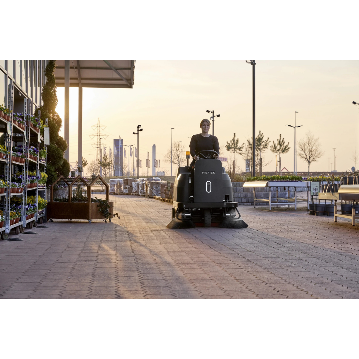 Nilfisk SW3000 Battery-Operated Ride-On Sweeper - Lifestyle 6