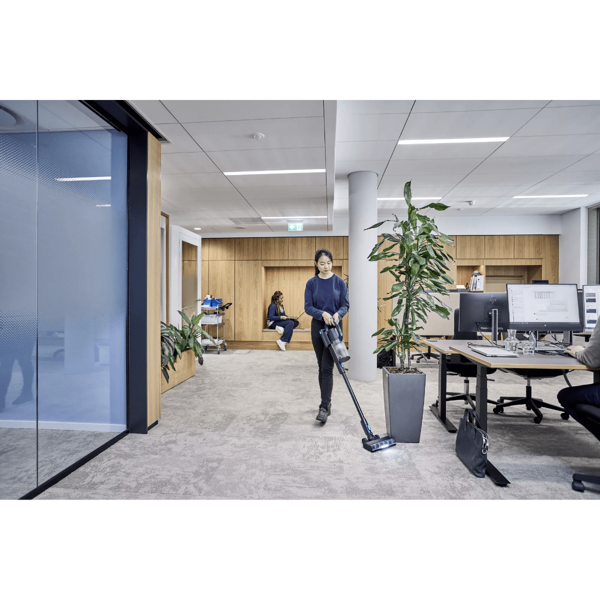 Nilfisk VU200 Cordless Stick Industrial HEPA Vacuum - Lifestyle 1