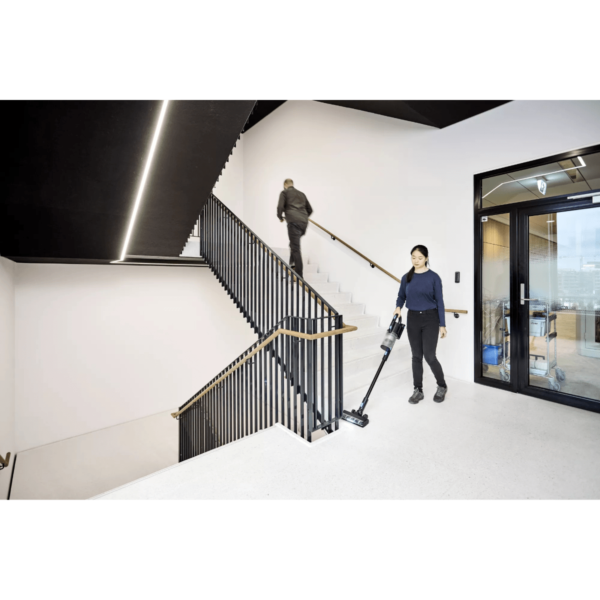 Nilfisk VU200 Cordless Stick Industrial HEPA Vacuum - Lifestyle 2