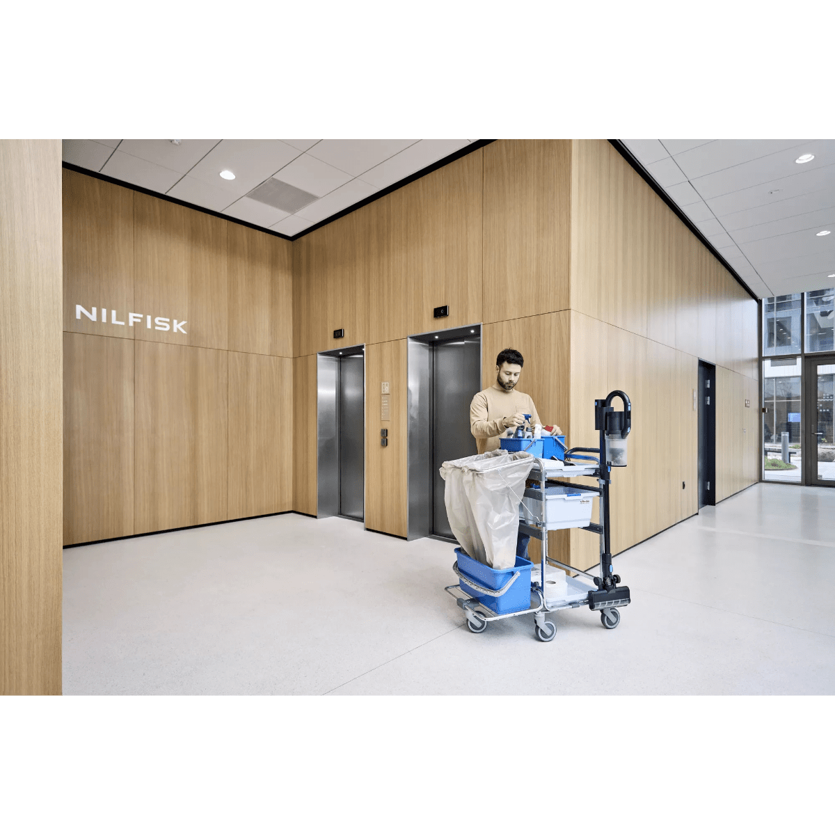 Nilfisk VU200 Cordless Stick Industrial HEPA Vacuum - Lifestyle 4