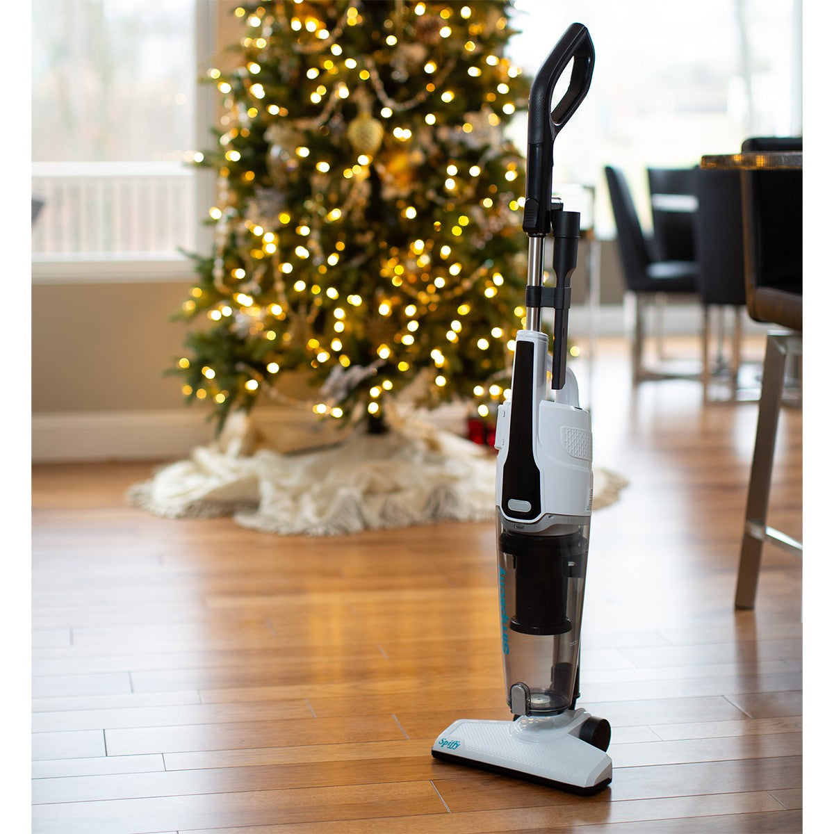 Simplicity Spiffy Broom Vacuum - in living room with Christmas tree in background