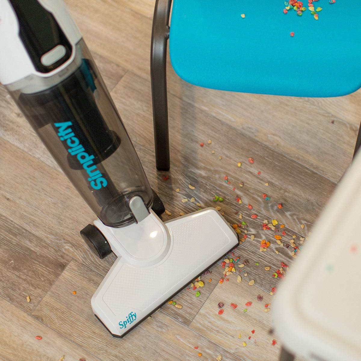 Simplicity Spiffy Broom Vacuum - cleaning spilled cereal