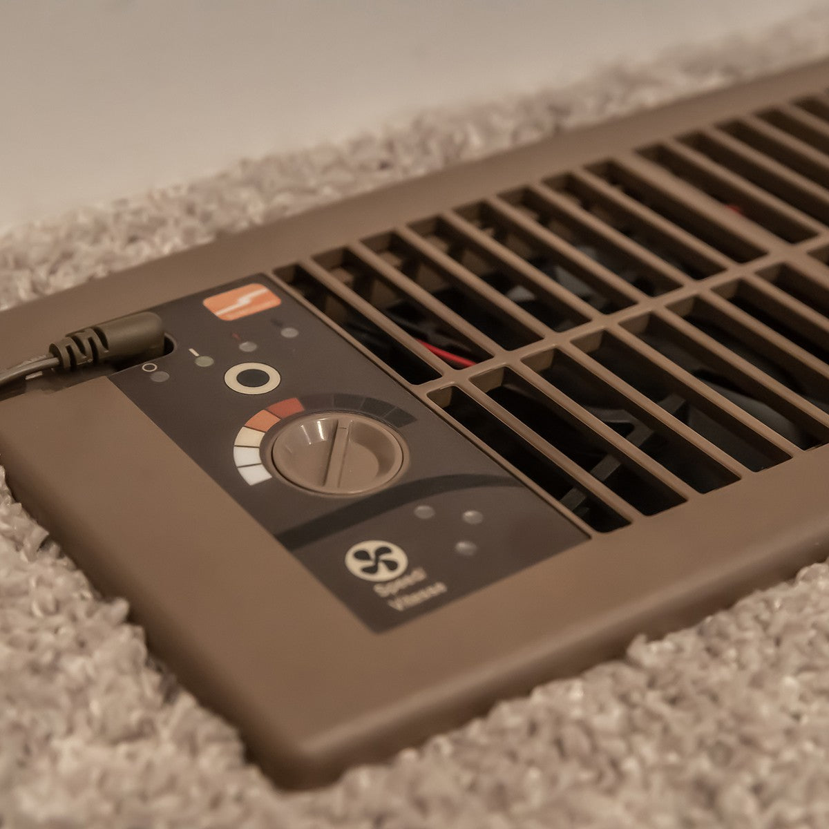 Suncourt Flush Fit Register Booster Fan - Brown on carpeting