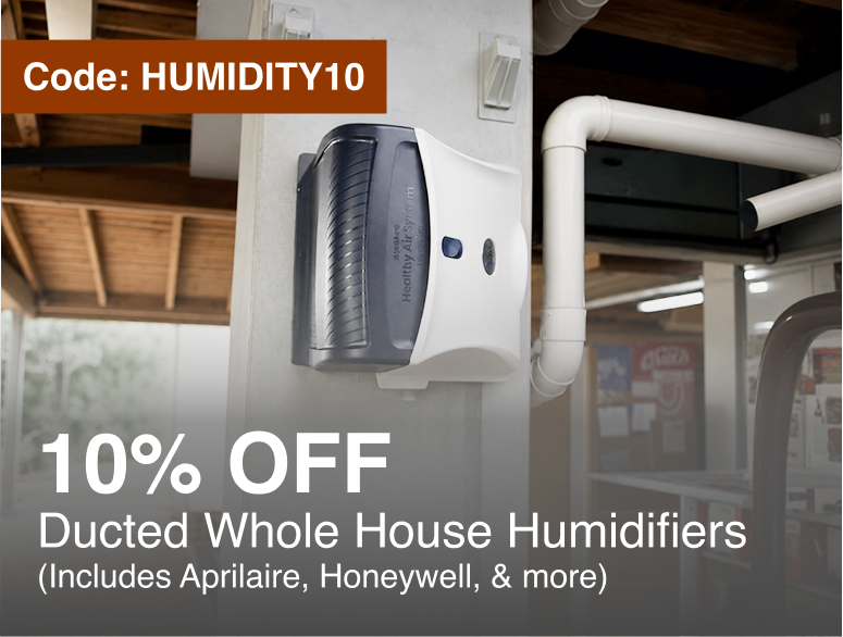 A wall-mounted humidifier shown installed in a real indoor environment with visible ceiling pipes and structure, plus large promotional text reading 'Code: HUMIDITY10' and '10% OFF Ducted Whole House Humidifiers (Includes Aprilia, Honeywell, & more)'.