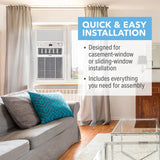 A Perfect Aire 10,000 BTU Casement Window Air Conditioner shown installed in a window inside a living room. The room has beige curtains, a gray sofa with patterned pillows, wood floors, and a glass coffee table. Quick and easy installation notes on a card.