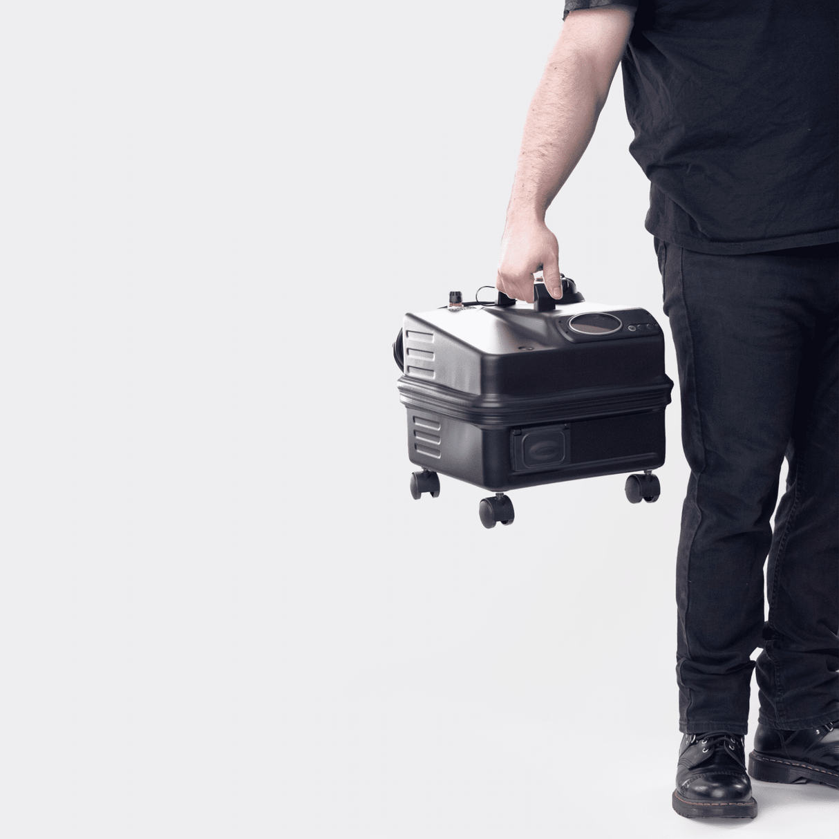 Person holding the US Steam Eagle steam cleaner