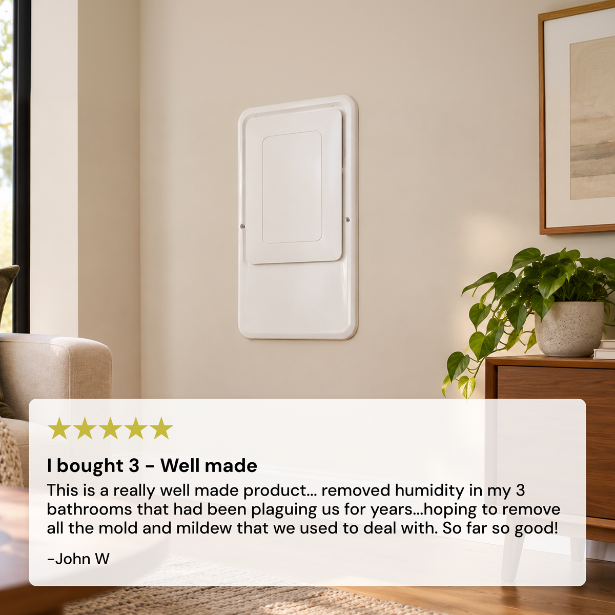 A white wall-mounted Santa Fe In-Wall Dehumidifier (UltraMD33) panel shown in a styled interior, with a large review overlay at the bottom containing a five-star rating and customer text I bought 3 - well made.