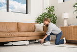 SEBO Automatic X7 Premium Upright folds flat to clean beneath the couch