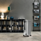 DeLonghi TRRS0715E Oil-Filled Radiator Heater - in Living Room