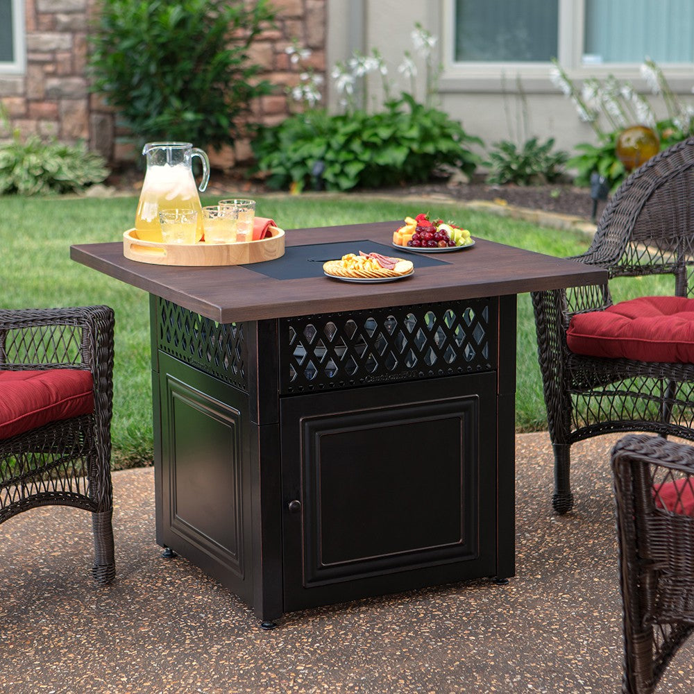 Endless Summer Donovan DualHeat Outdoor LP Gas Fire Pit - on Patio in Summer