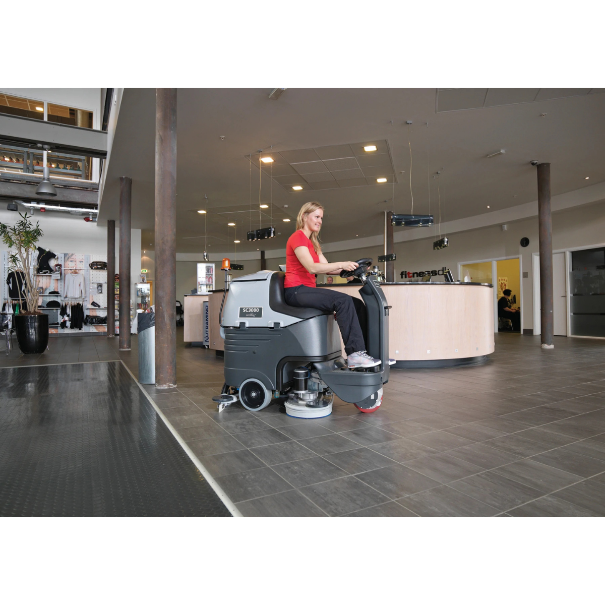 Nilfisk SC3000 Battery Ride-On Floor Scrubber - Lifestyle 1